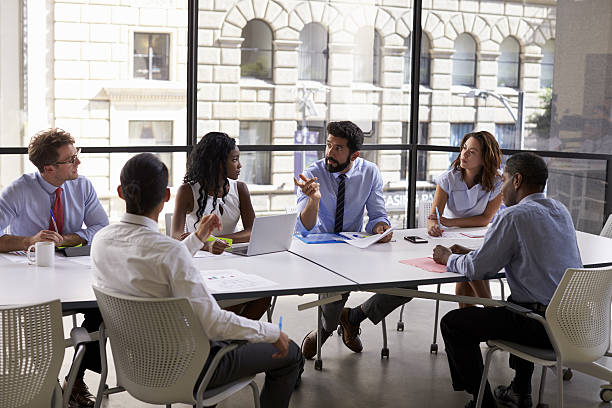 corporate business team and manager in a meeting, close up